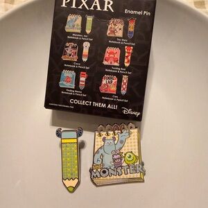 Disney PIXAR Monsters Inc. Mystery pin notebook & pencil enamel pin
